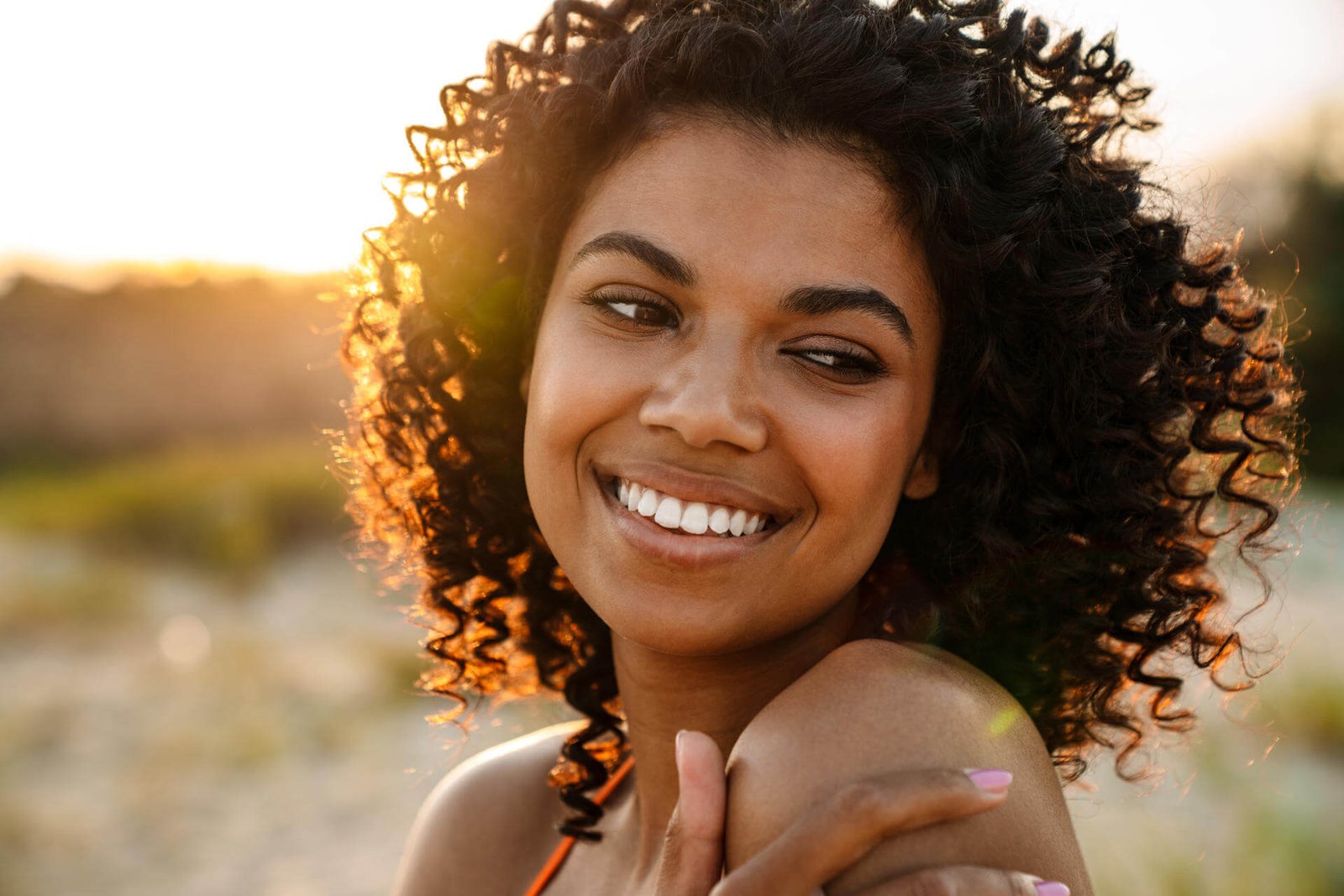 smiling-young-african-woman-walking-at-the-beach-2025-02-16-08-47-14-utc.jpg smiling-young-african-woman-walking-at-the-beach-2025-02-16-08-47-14-utc.jpg